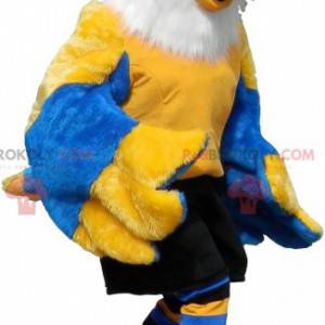 Mascot pájaro amarillo, blanco y azul en ropa deportiva -