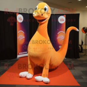 Orange Diplodocus mascot costume character dressed with a Yoga Pants and Shawl pins