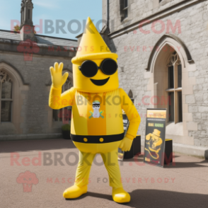 Yellow Irish Castle mascot costume character dressed with a Jumpsuit and Sunglasses