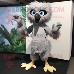 Gray Harpy mascot costume character dressed with a Romper and Shoe clips