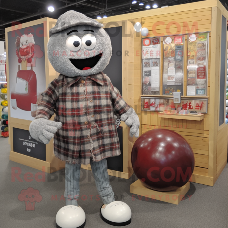 Gray Human Cannon Ball mascot costume character dressed with a Flannel Shirt and Coin purses