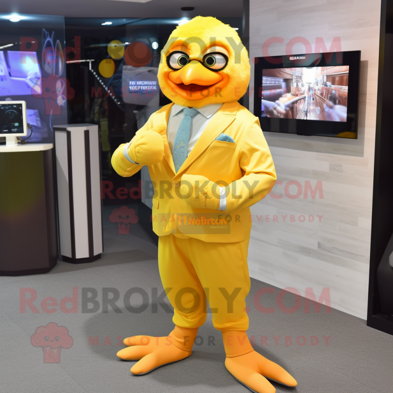 Peach Canary mascot costume character dressed with a Suit and Digital watches