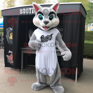 Silver Bobcat mascot costume character dressed with a Cover-up and Headbands