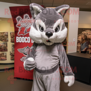 Silver Bobcat mascot costume character dressed with a Cover-up and Headbands