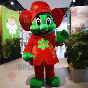 Red Four Leaf Clover mascot costume character dressed with a Cover-up and Brooches