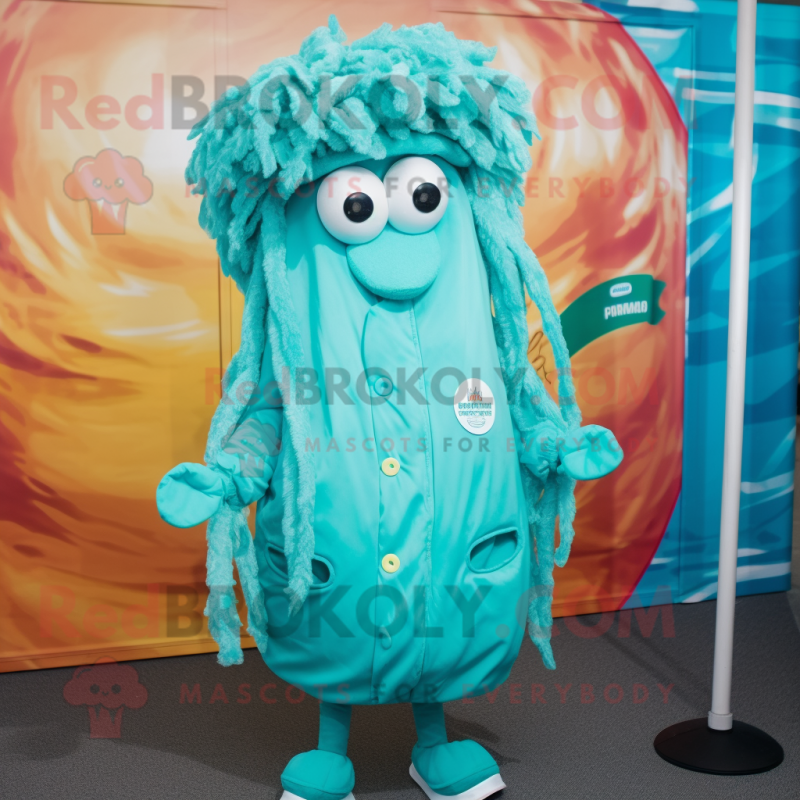 Turquoise Fried Calamari mascot costume character dressed with a Parka and Tie pins Turquoise Fried Calamari mascot costume character dressed with a Parka and Tie pins