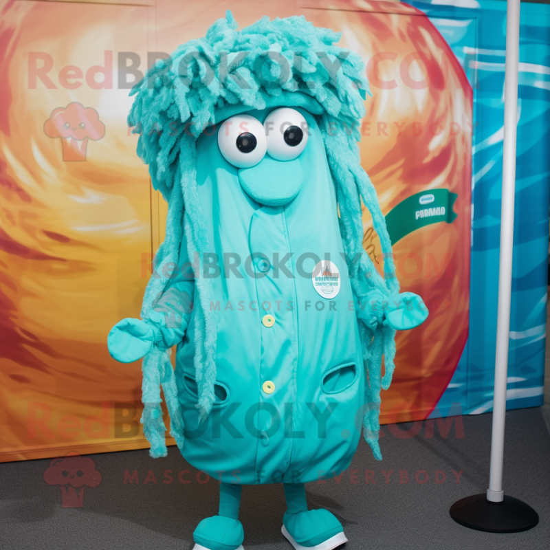 Turquoise Fried Calamari mascot costume character dressed with a Parka and Tie pins