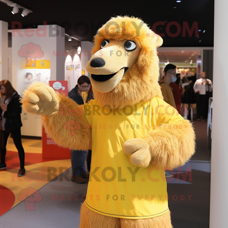 Yellow Camel mascot costume character dressed with a Long Sleeve Tee and Shawl pins