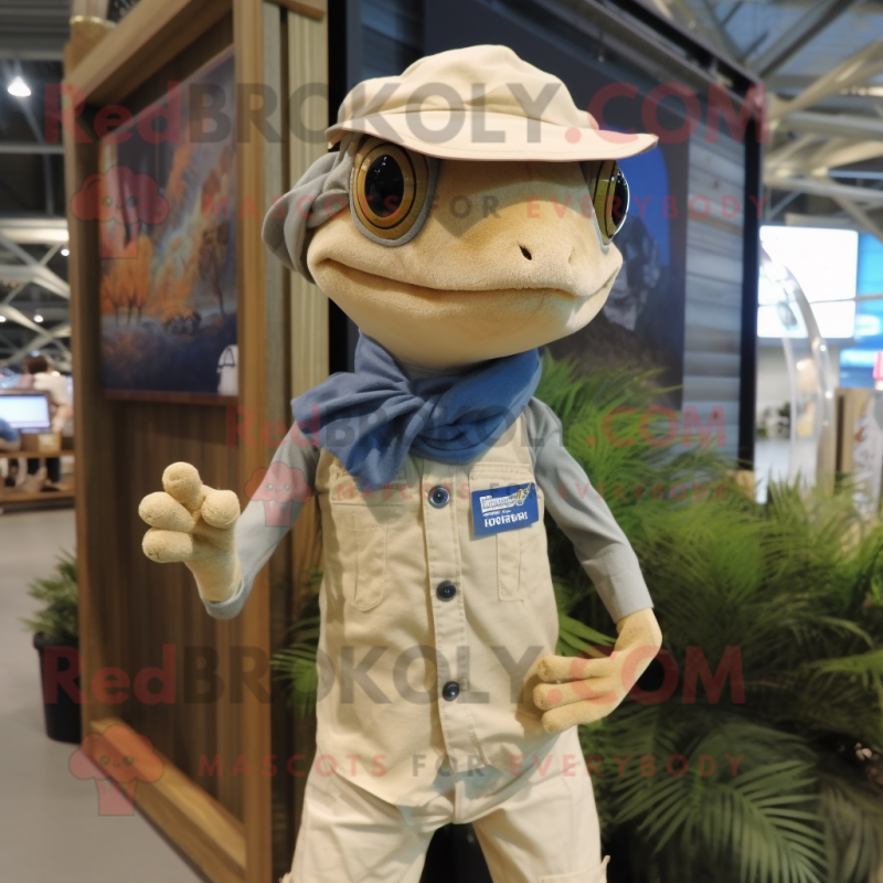 Tan Geckos mascot costume character dressed with a Chambray Shirt and Scarves Tan Geckos mascot costume character dressed with a Chambray Shirt and Scarves