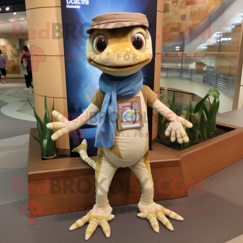 Tan Geckos mascot costume character dressed with a Chambray Shirt and Scarves Tan Geckos mascot costume character dressed with a Chambray Shirt and Scarves