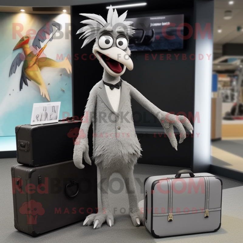 Gray Archeopteryx mascot costume character dressed with a Midi Dress and Briefcases