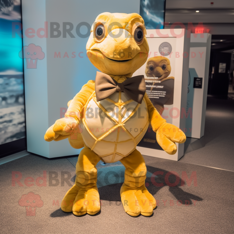 Gold Sea Turtle mascot costume character dressed with a Culottes and Bow ties