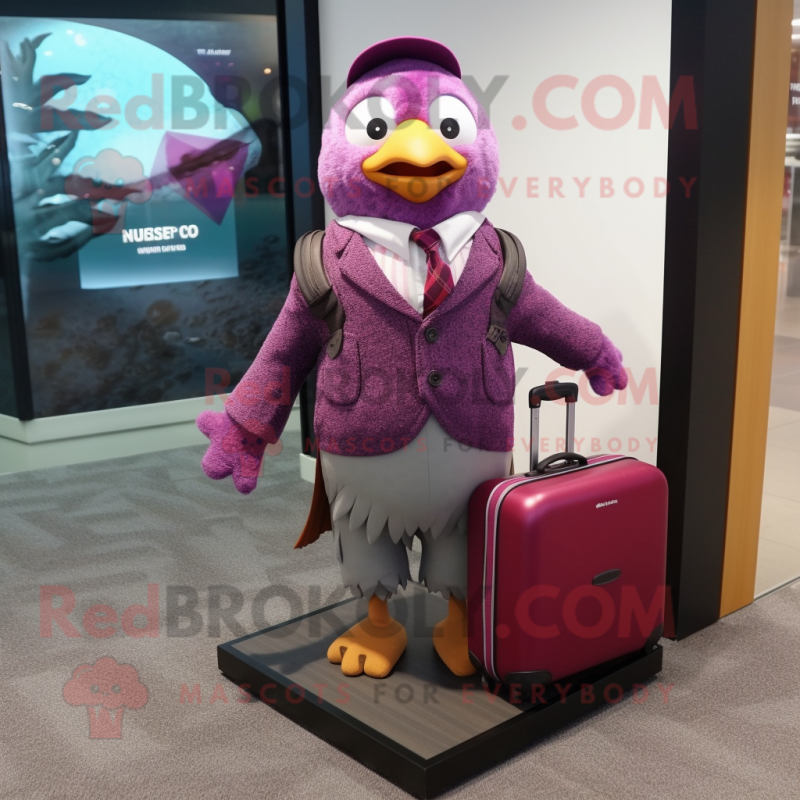 Magenta Quail mascot costume character dressed with a Cardigan and Briefcases