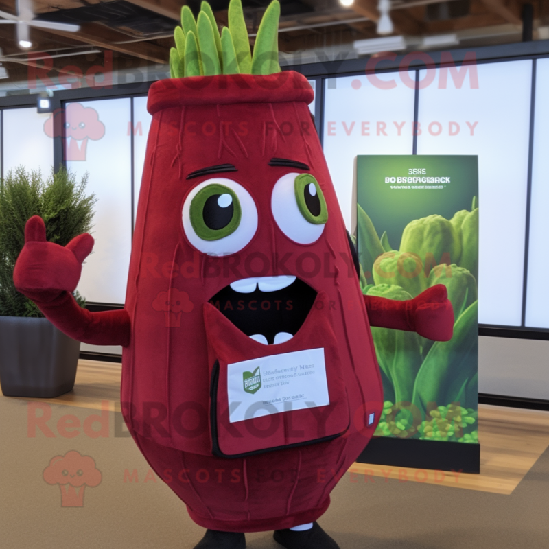 Maroon Celery mascot costume character dressed with a V-Neck Tee and Messenger bags Maroon Celery mascot costume character dressed with a V-Neck Tee and Messenger bags
