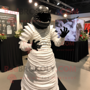 Black Trilobite mascot costume character dressed with a Wedding Dress and Gloves