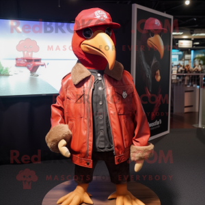 Red Albatross mascot costume character dressed with a Leather Jacket and Hat pins