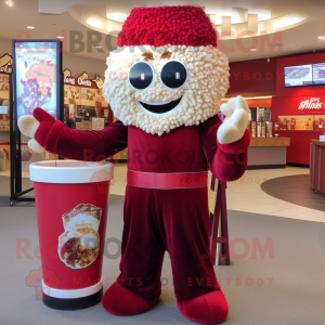 Maroon Pop Corn mascot costume character dressed with a T-Shirt and Wraps