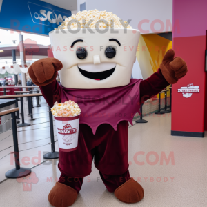 Maroon Pop Corn mascot costume character dressed with a T-Shirt and Wraps