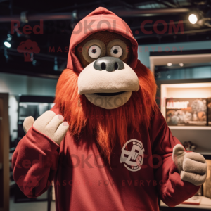 Maroon Orangutan mascot costume character dressed with a Sweatshirt and Caps