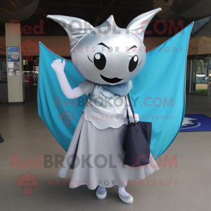 Silver Manta Ray mascot costume character dressed with a Wrap Skirt and Tote bags