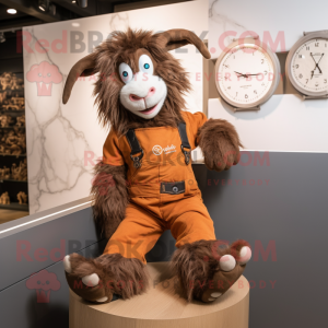Brown Angora Goat mascot costume character dressed with a Dungarees and Bracelet watches