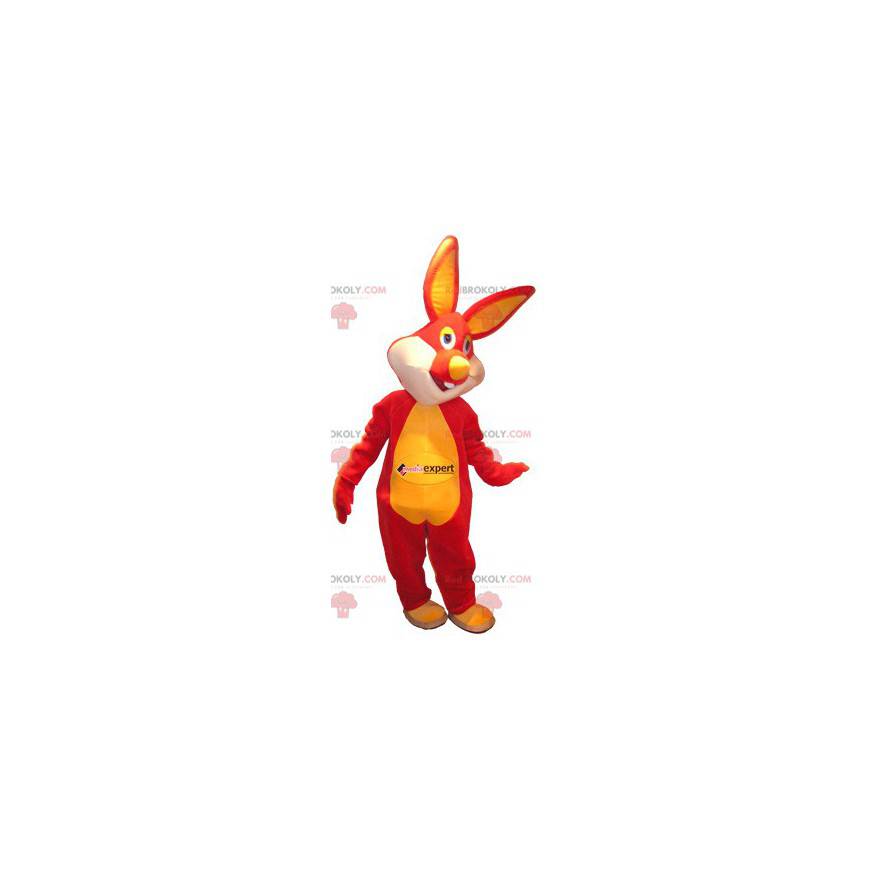 Mascote coelho vermelho e amarelo com olhos coloridos -