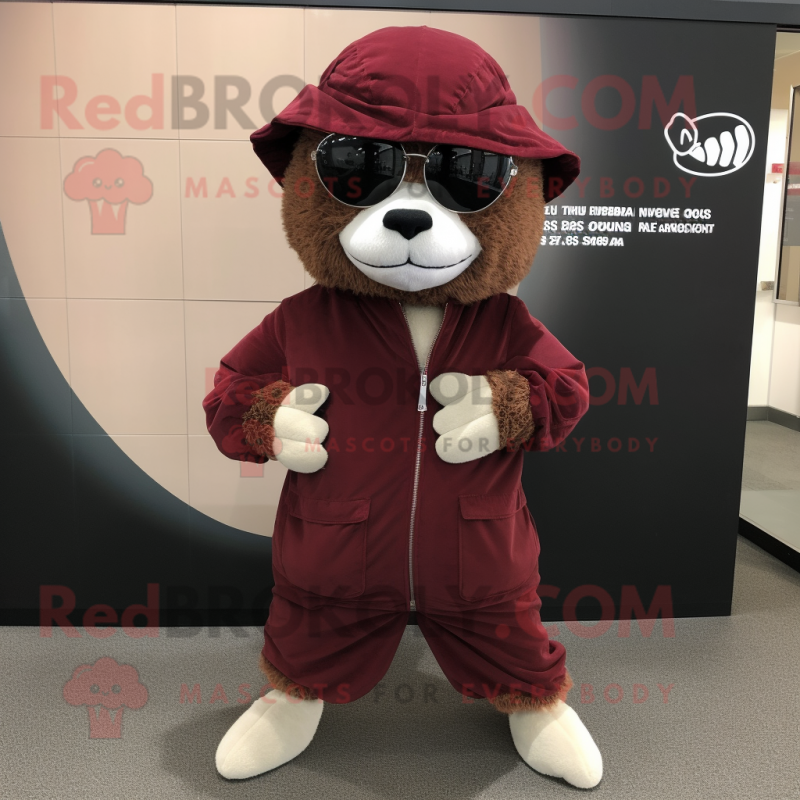 Maroon Pangolin mascot costume character dressed with a Parka and Sunglasses