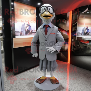 Gray Geese mascot costume character dressed with a Suit Pants and Eyeglasses