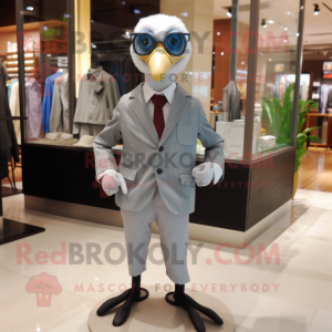 Gray Geese mascot costume character dressed with a Suit Pants and Eyeglasses