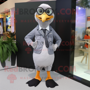 Gray Geese mascot costume character dressed with a Suit Pants and Eyeglasses