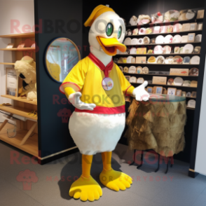 Gold Muscovy Duck mascot costume character dressed with a Board Shorts and Coin purses