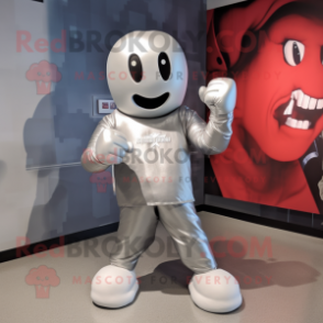 Silver Boxing Glove mascot costume character dressed with a Graphic Tee and Shoe laces