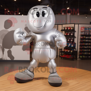 Silver Boxing Glove mascot costume character dressed with a Graphic Tee and Shoe laces
