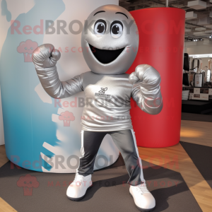 Silver Boxing Glove mascot costume character dressed with a Graphic Tee and Shoe laces