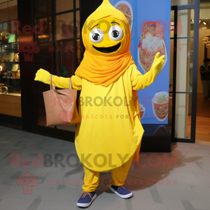 Yellow Biryani mascot costume character dressed with a Sweatshirt and Tote bags