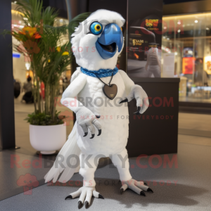 White Macaw mascot costume character dressed with a Skinny Jeans and Rings