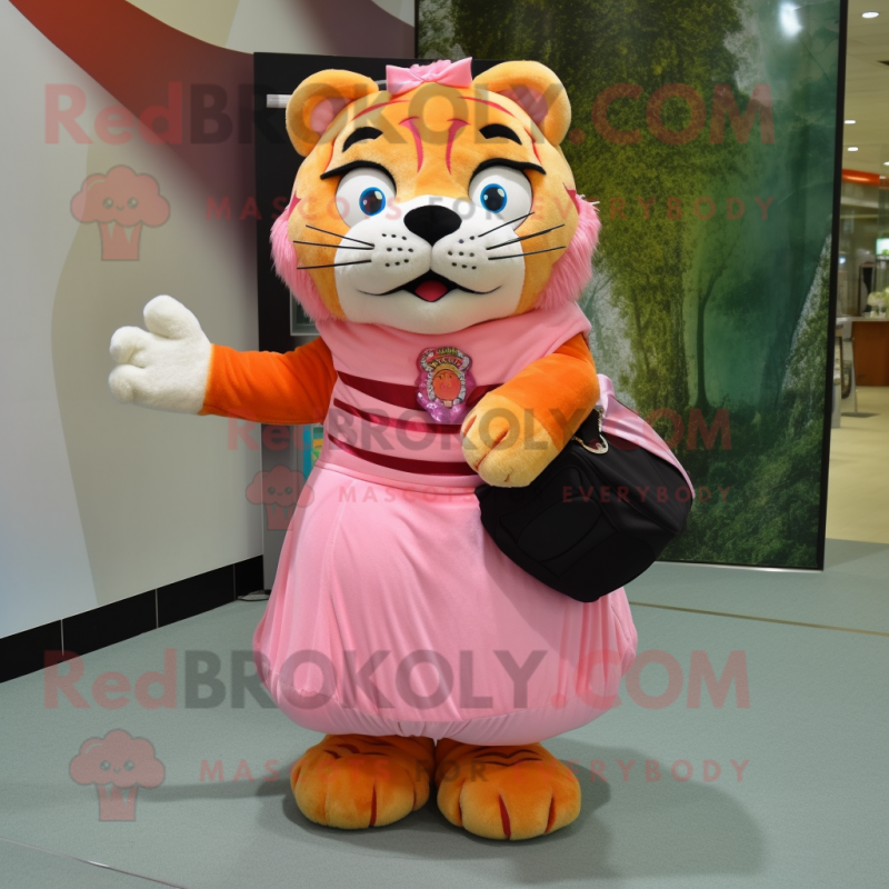 Peach Tiger mascot costume character dressed with a Ball Gown and Messenger bags