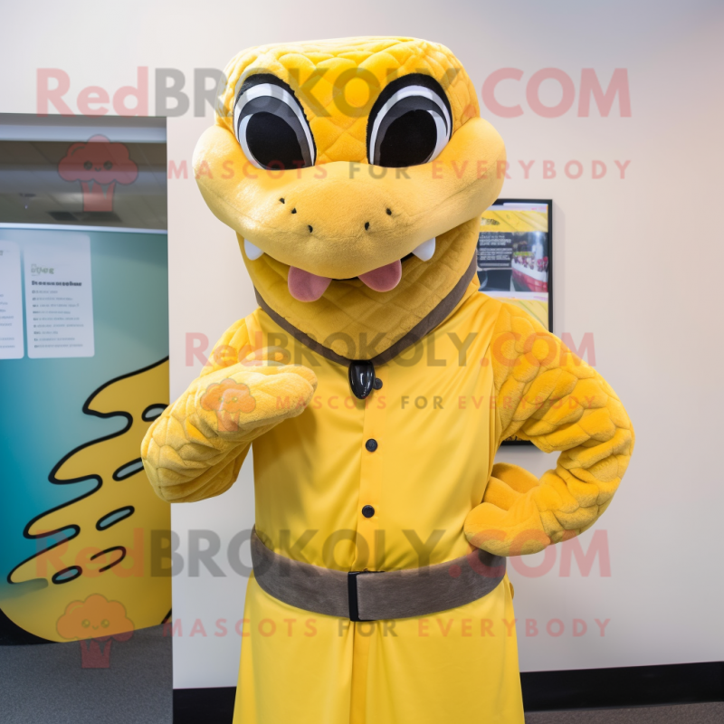 Yellow Python mascot costume character dressed with a Oxford Shirt and Mittens