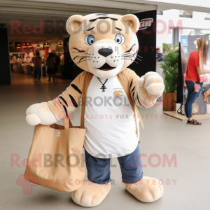 Tan Tiger mascot costume character dressed with a Boyfriend Jeans and Tote bags