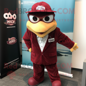Maroon Cod mascot costume character dressed with a Blazer and Berets