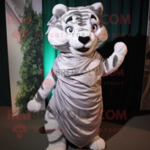 Silver Tiger mascot costume character dressed with a Wrap Skirt and Scarves