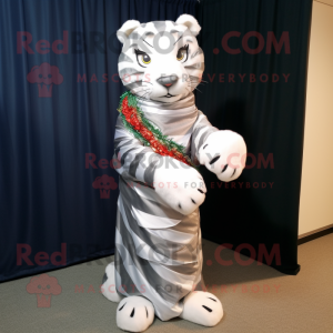 Silver Tiger mascot costume character dressed with a Wrap Skirt and Scarves