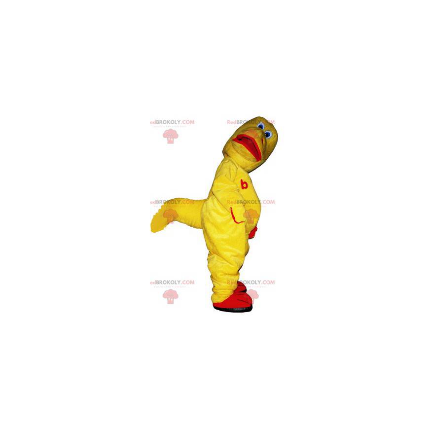 Engraçado mascote de dinossauro amarelo e vermelho -