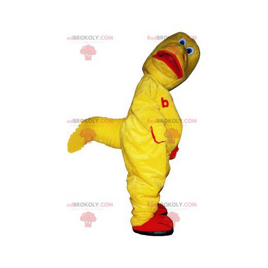 Legrační maskot tvora žlutého a červeného dinosaura -