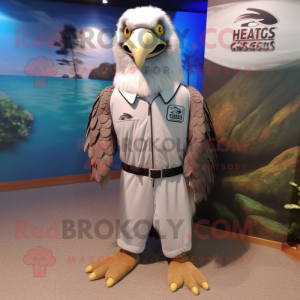 Silver Haast'S Eagle mascot costume character dressed with a Rash Guard and Tie pins