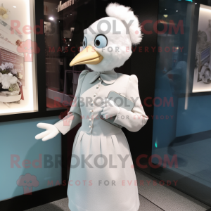 nan Dove mascot costume character dressed with a Pencil Skirt and Lapel pins