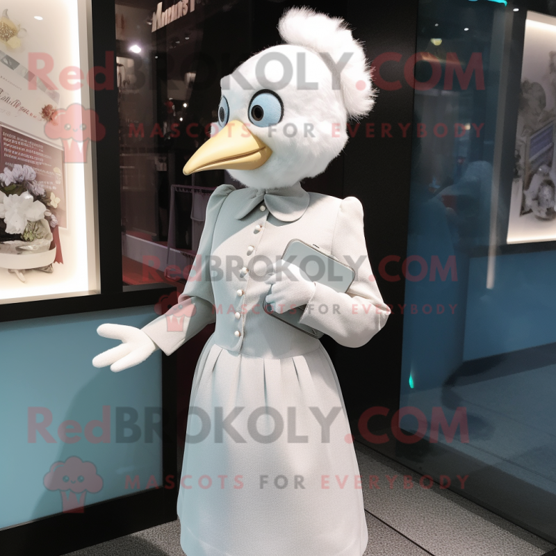 nan Dove mascot costume character dressed with a Pencil Skirt and Lapel pins nan Dove mascot costume character dressed with a Pencil Skirt and Lapel pins