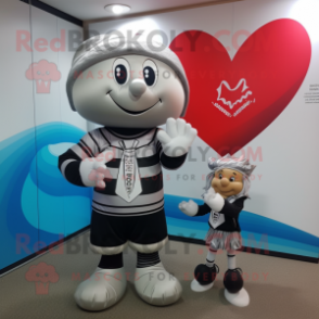 Silver Arrow Of Love mascot costume character dressed with a Rugby Shirt and Beanies