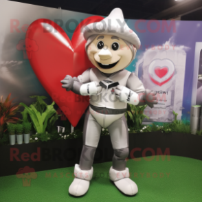 Silver Arrow Of Love mascot costume character dressed with a Rugby Shirt and Beanies