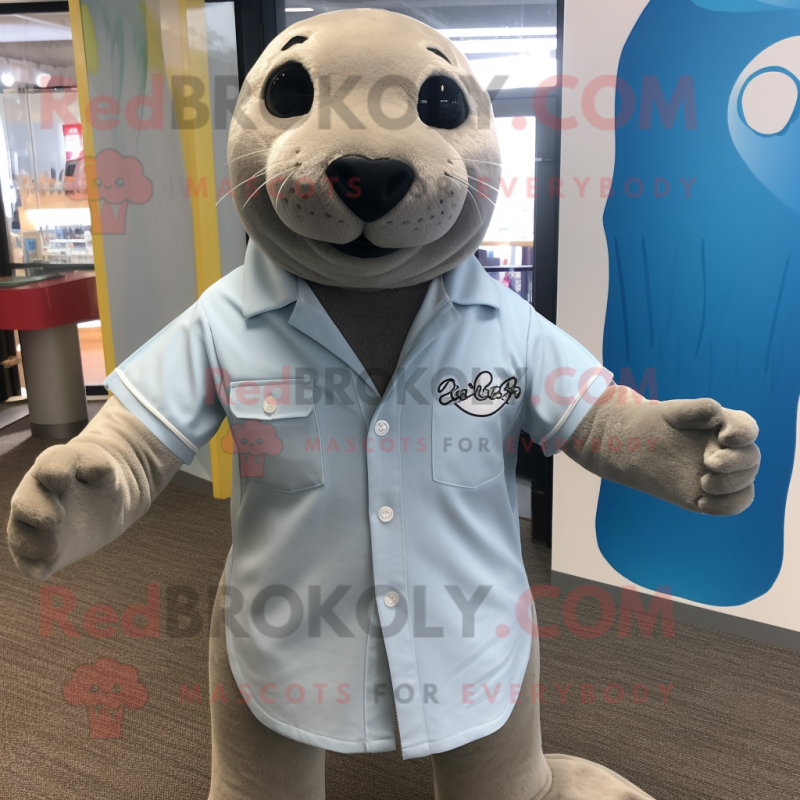 Silver Sea Lion mascot costume character dressed with a Button-Up Shirt and Headbands